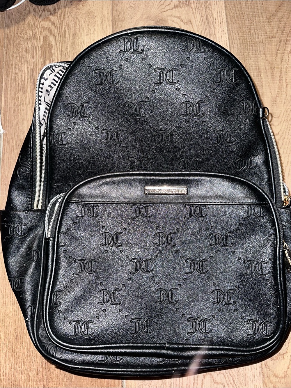 Juicy Couture Black Embossed Monogram Backpack